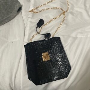 Black and gold purse